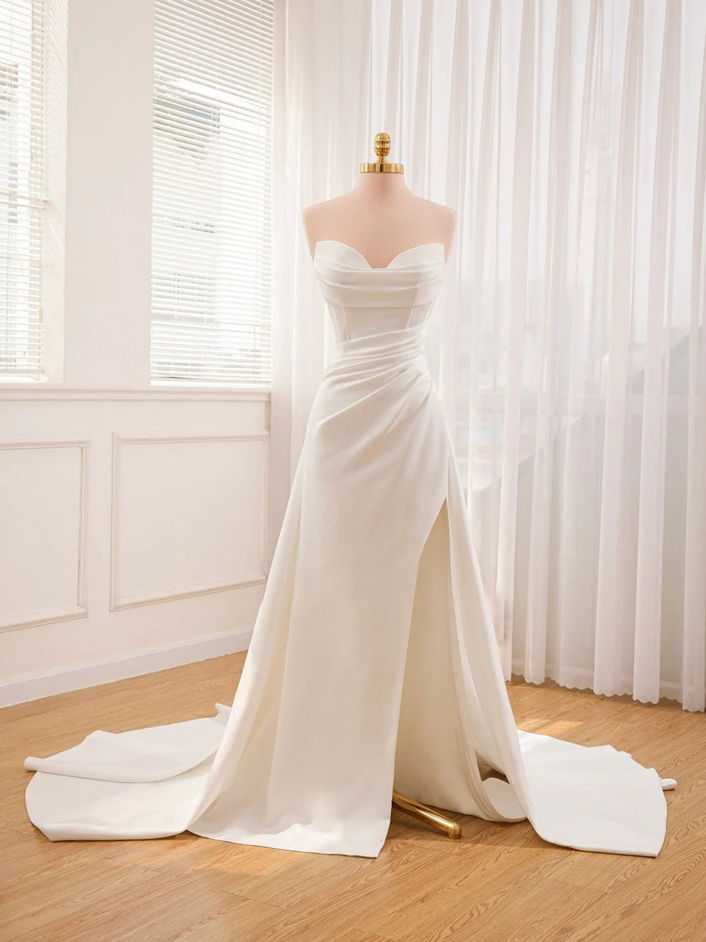 Elegant mermaid bodycon off-shoulder satin wedding dress.