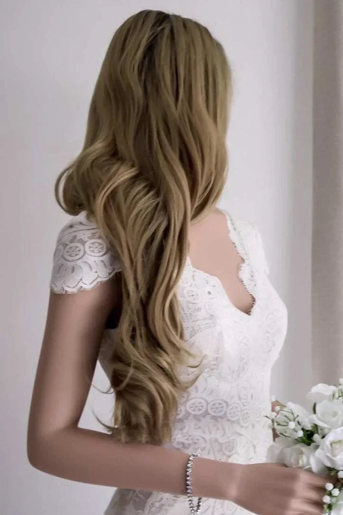 Side view of the mermaid wedding dress, showcasing its elegant silhouette.