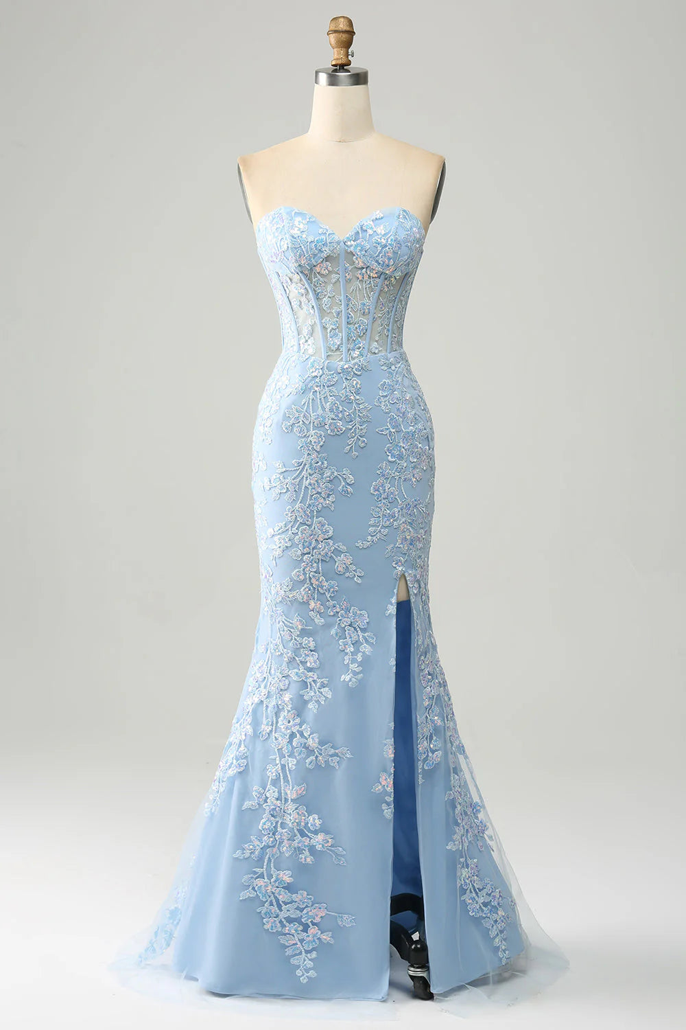 Light blue mermaid prom dress with corset bodice and side slit.