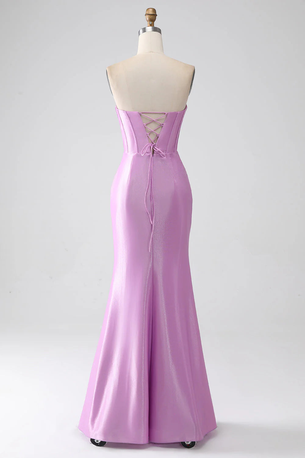 Side view of the purple mermaid prom dress, showcasing the flowing pleated skirt.