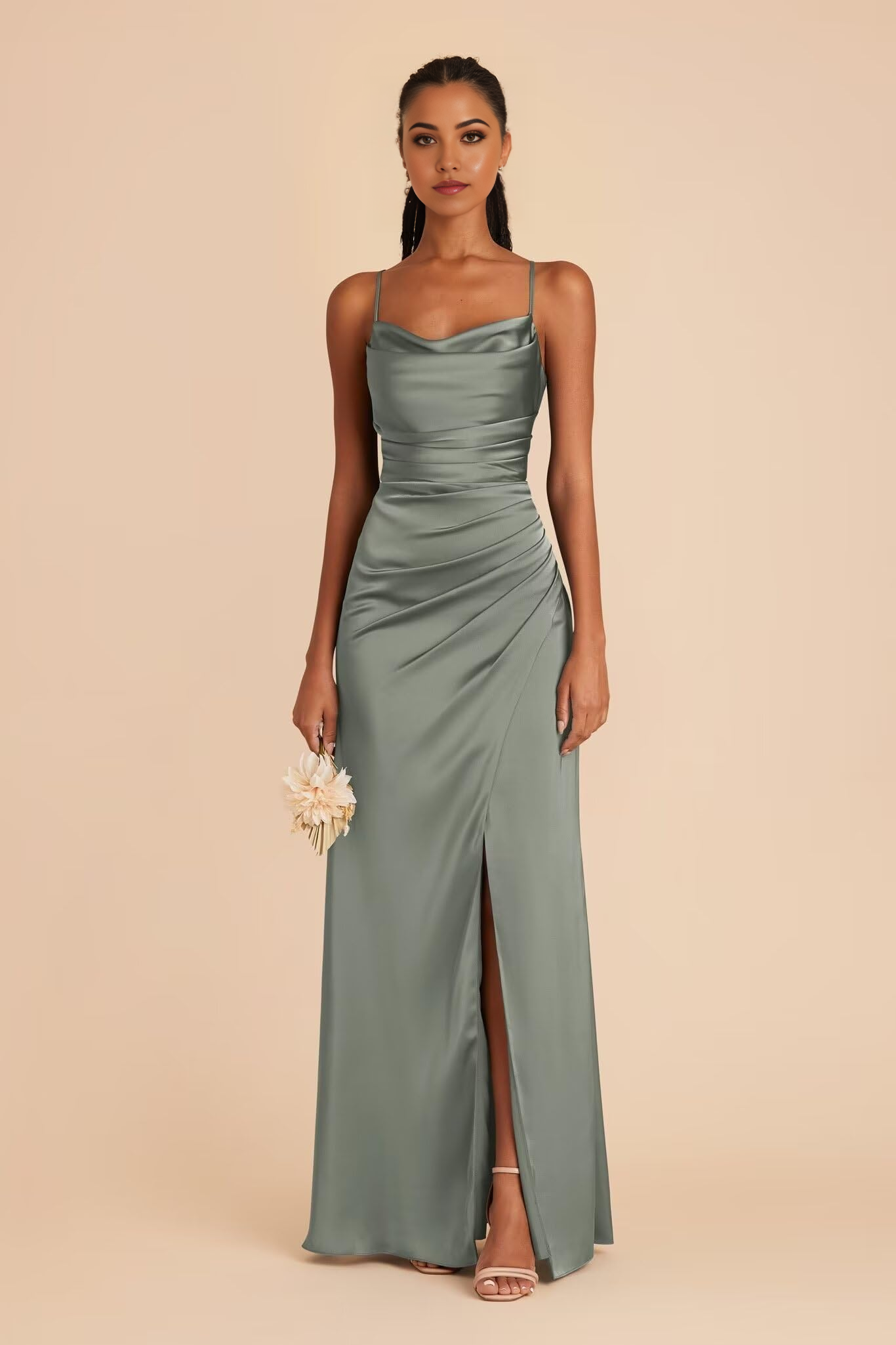 Elegant mermaid formal dress with cowl neck and spaghetti straps, featuring a high slit.