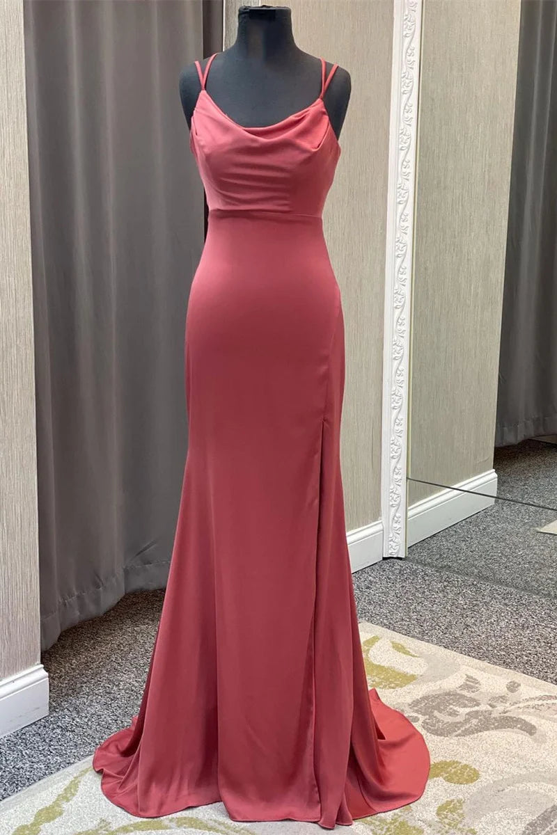 Full-length view of a mermaid evening gown with cowl neck and straps.