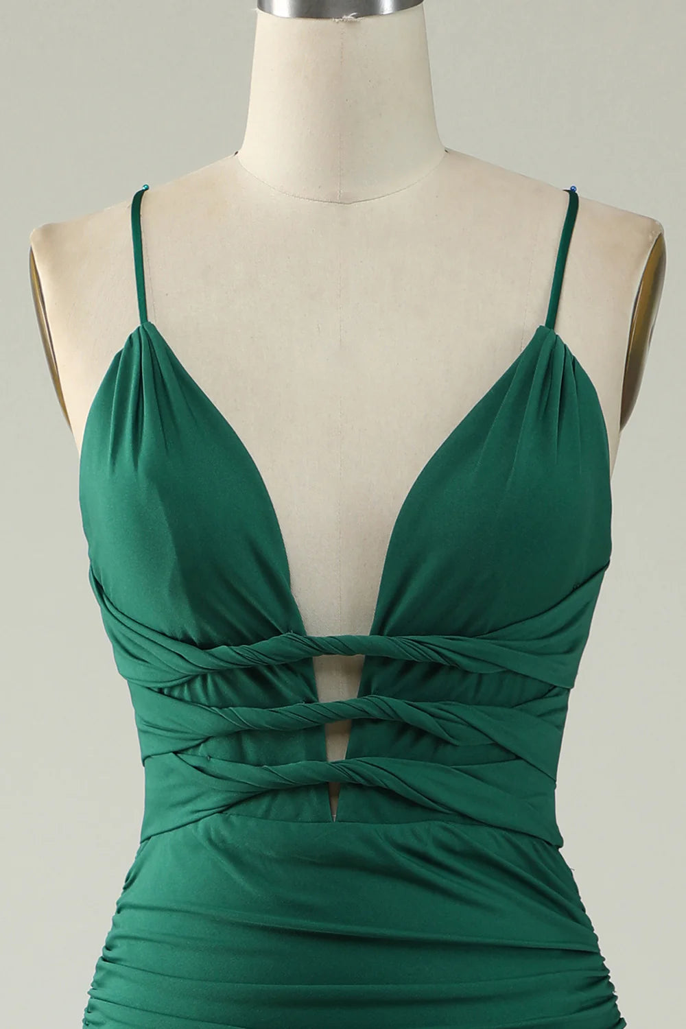Back view of dark green mermaid deep V-neck long prom dress.