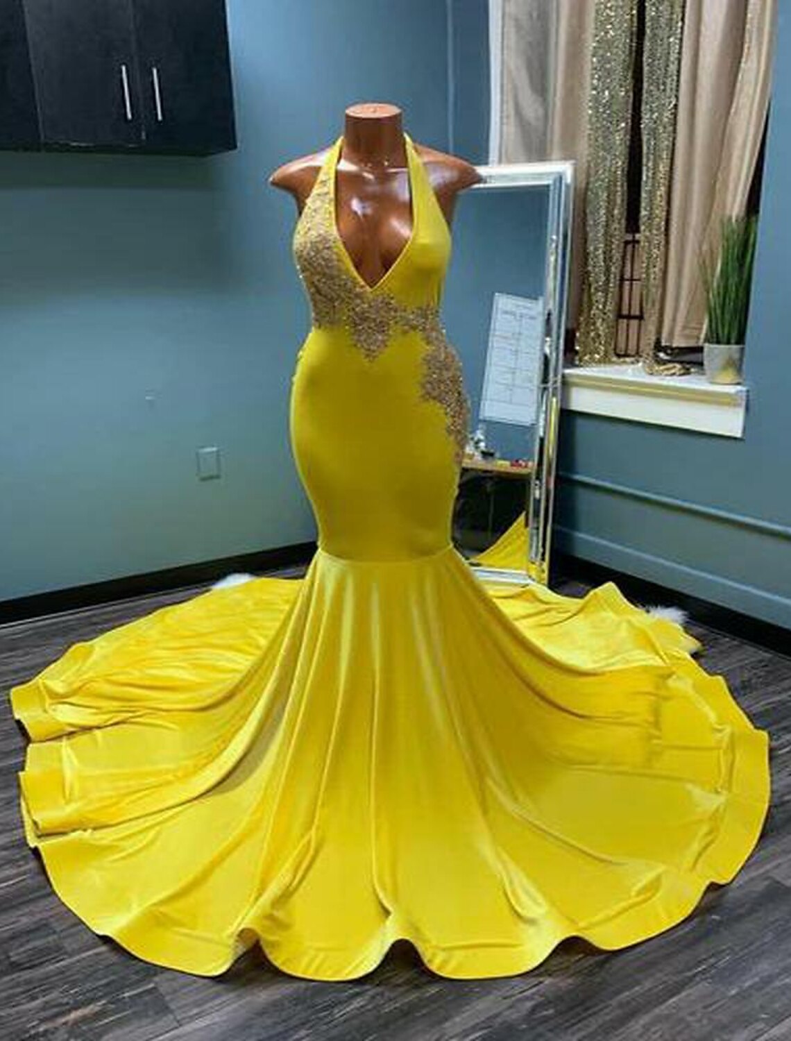 Elegant Mermaid Halter Backless Evening Gown with Chapel Train and Crystal Appliques.