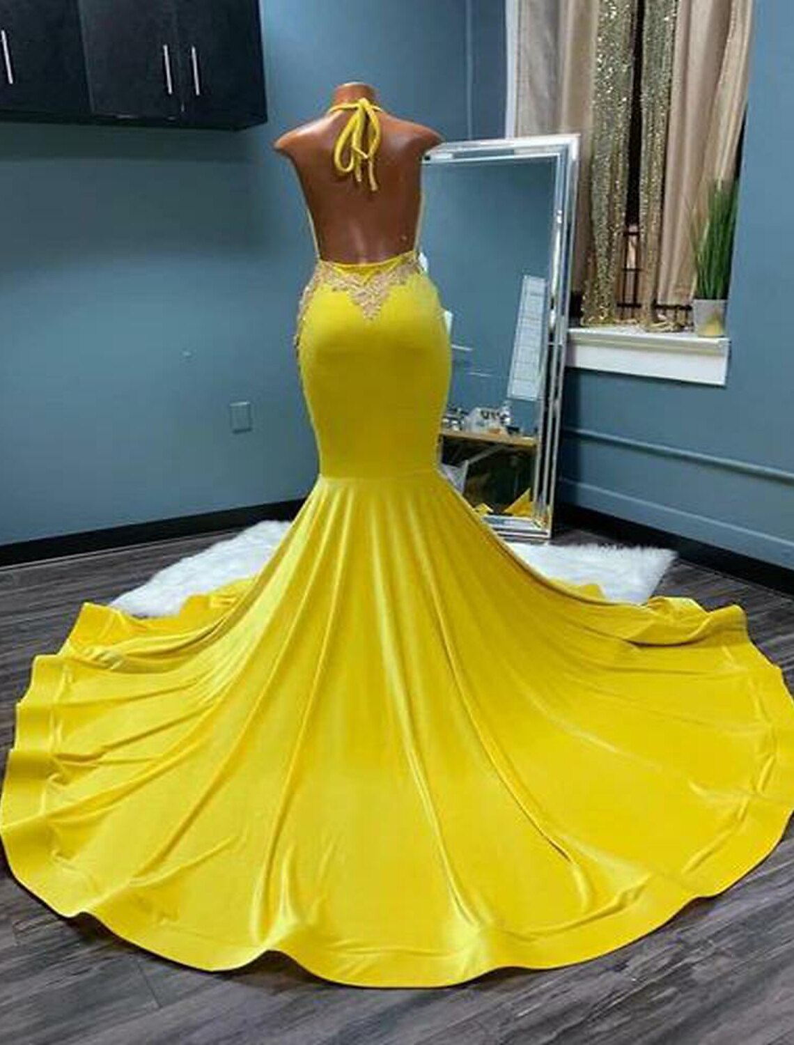 Back view of Mermaid Halter Evening Gown showcasing chapel train and backless design.
