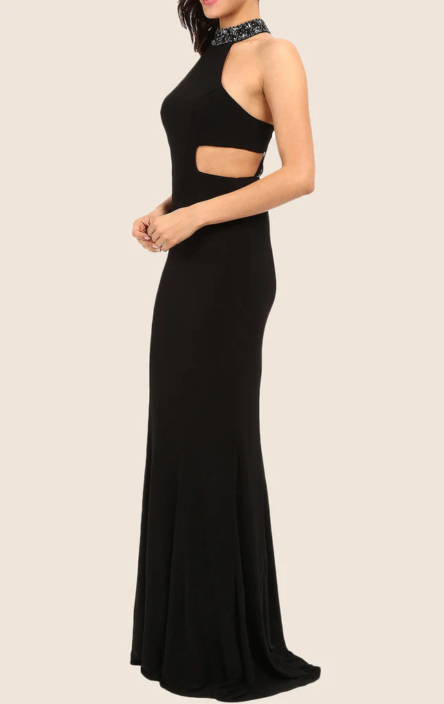 Side view of a woman in a sophisticated halter mermaid dress.