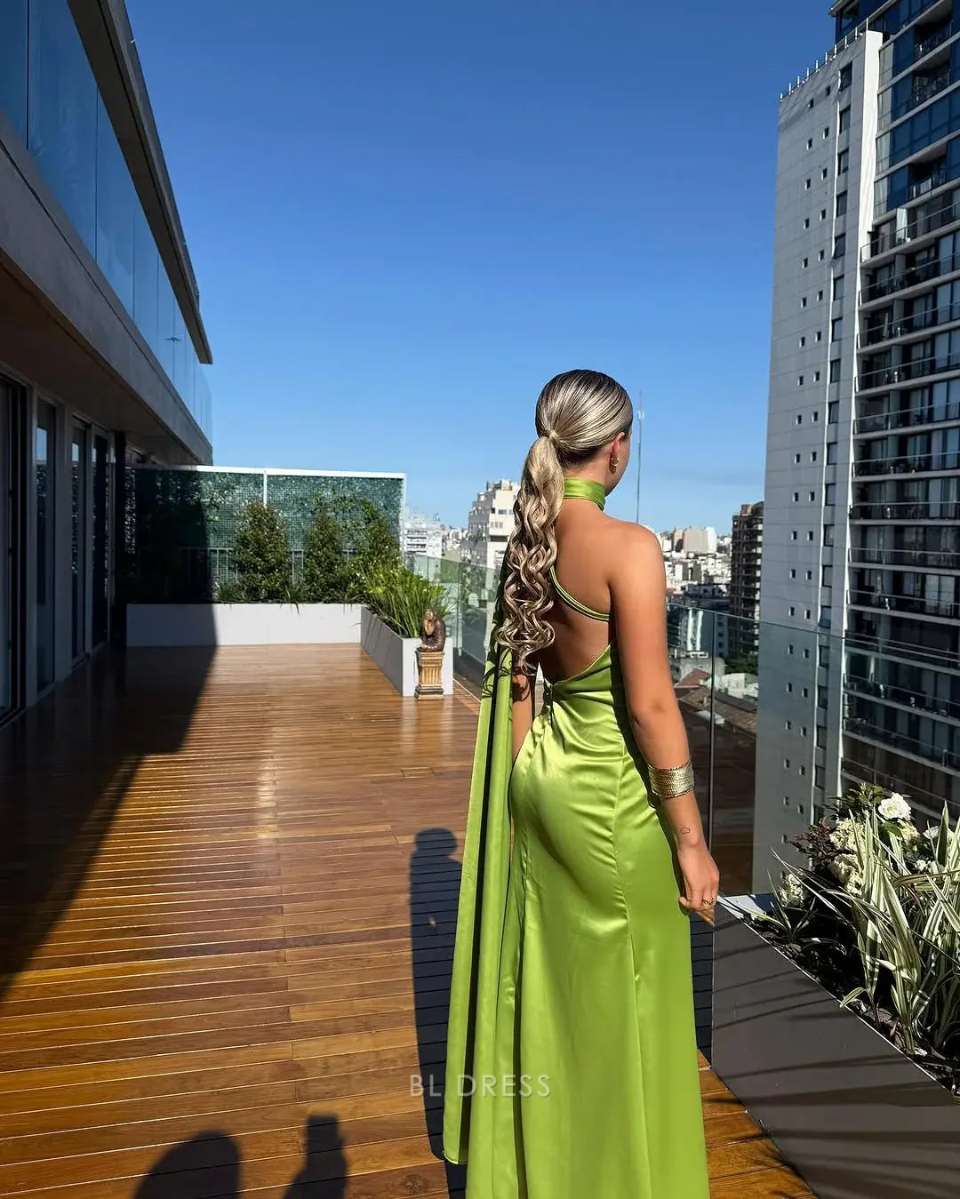 Back view of the green mermaid halter evening gown.