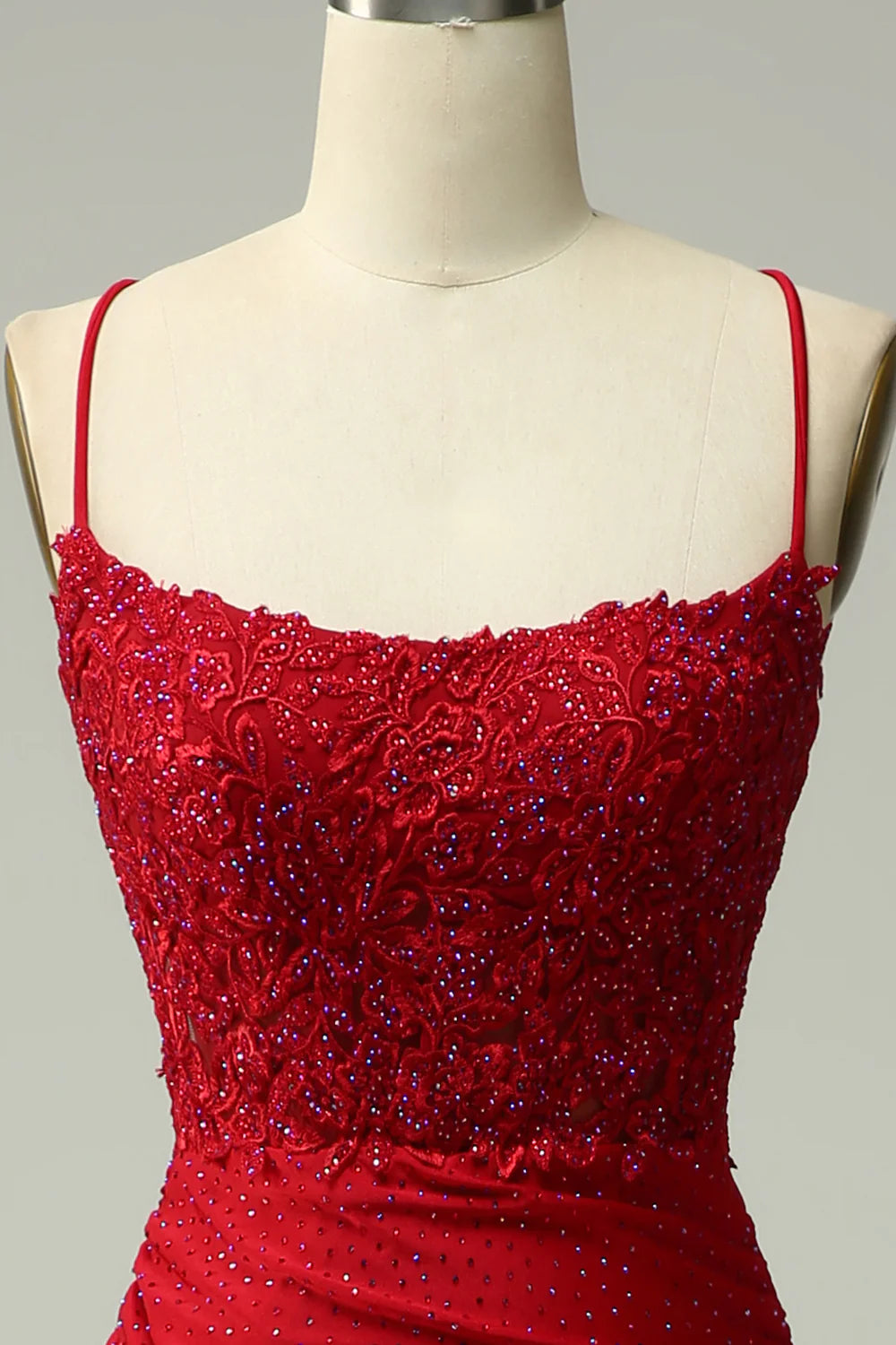 Back view of the mermaid halter long prom dress, highlighting the flowing train and beaded details.