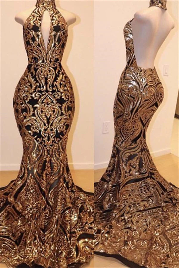 Elegant mermaid prom dress with halter neckline and intricate appliques.