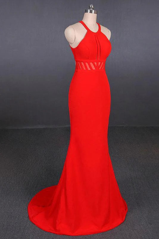 Side profile of a woman in the elegant mermaid halter prom dress.