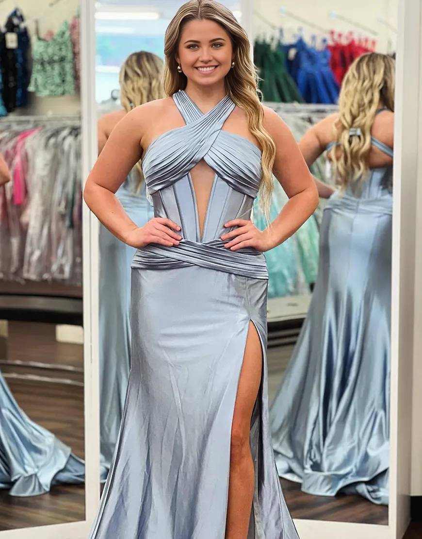 Back view of dark green satin mermaid formal dress.