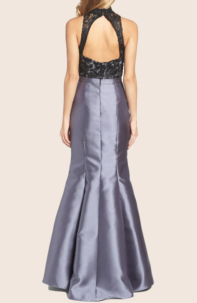 Side view of the mermaid lace formal gown, showcasing its silhouette.