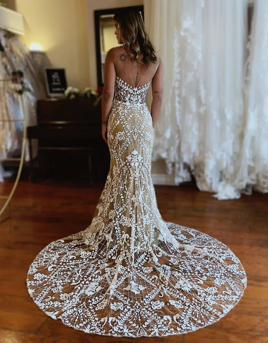 Back view of dark champagne mermaid wedding dress with lace train.