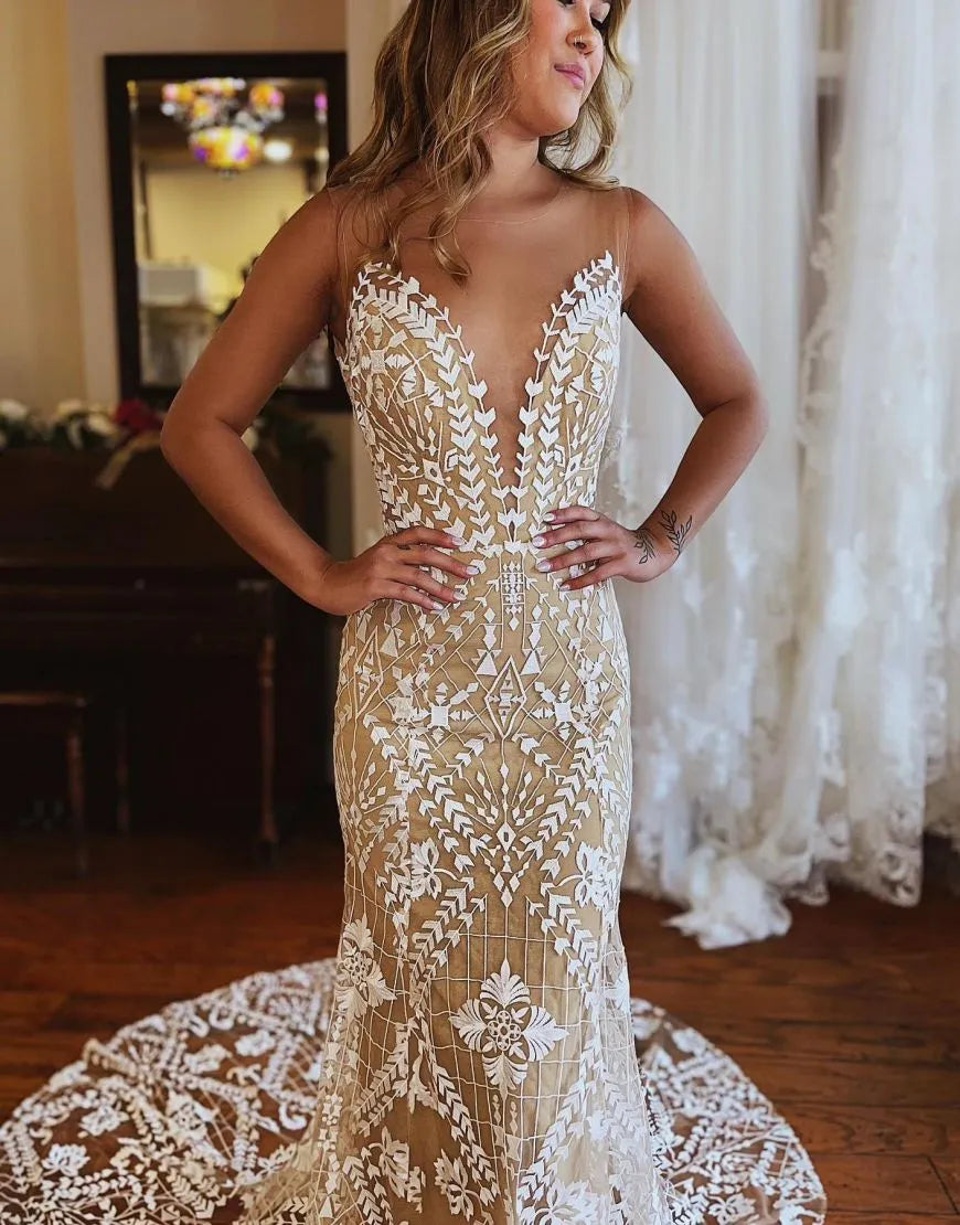 Side view of dark champagne mermaid wedding dress, showcasing lace and silhouette.