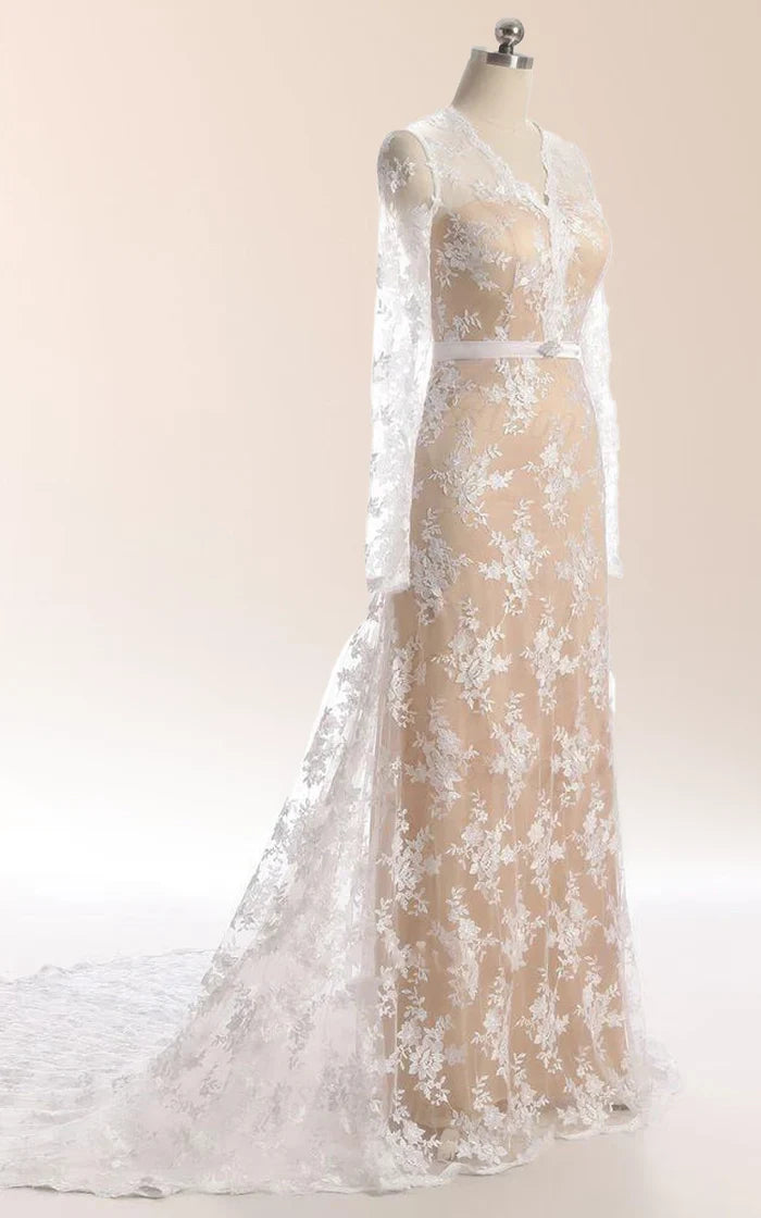 Back view of a mermaid lace dress with a flowing court train.