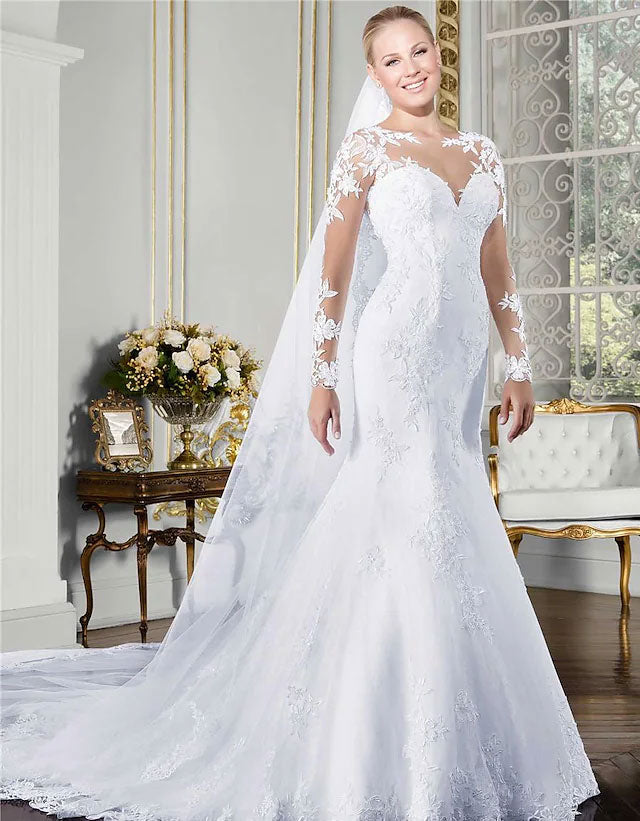 Elegant mermaid wedding dress with jewel neck and long lace sleeves.
