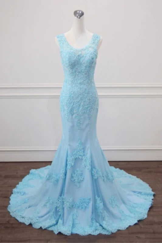 Elegant mermaid prom dress with lace and beaded appliques.