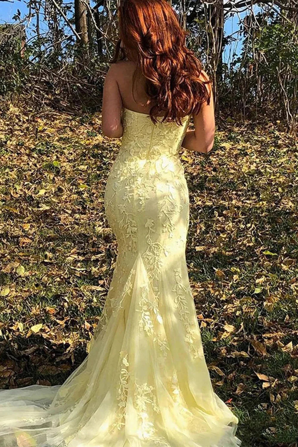 Close-up of the lace detail on the strapless mermaid gown.