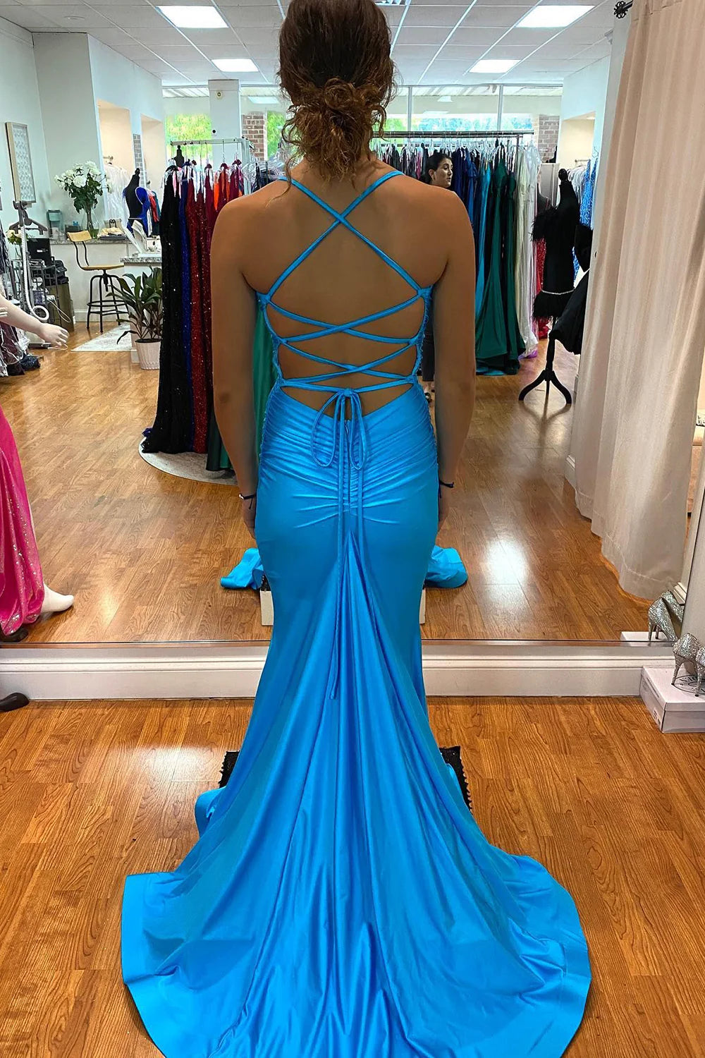 Front view of an elegant mermaid evening dress.