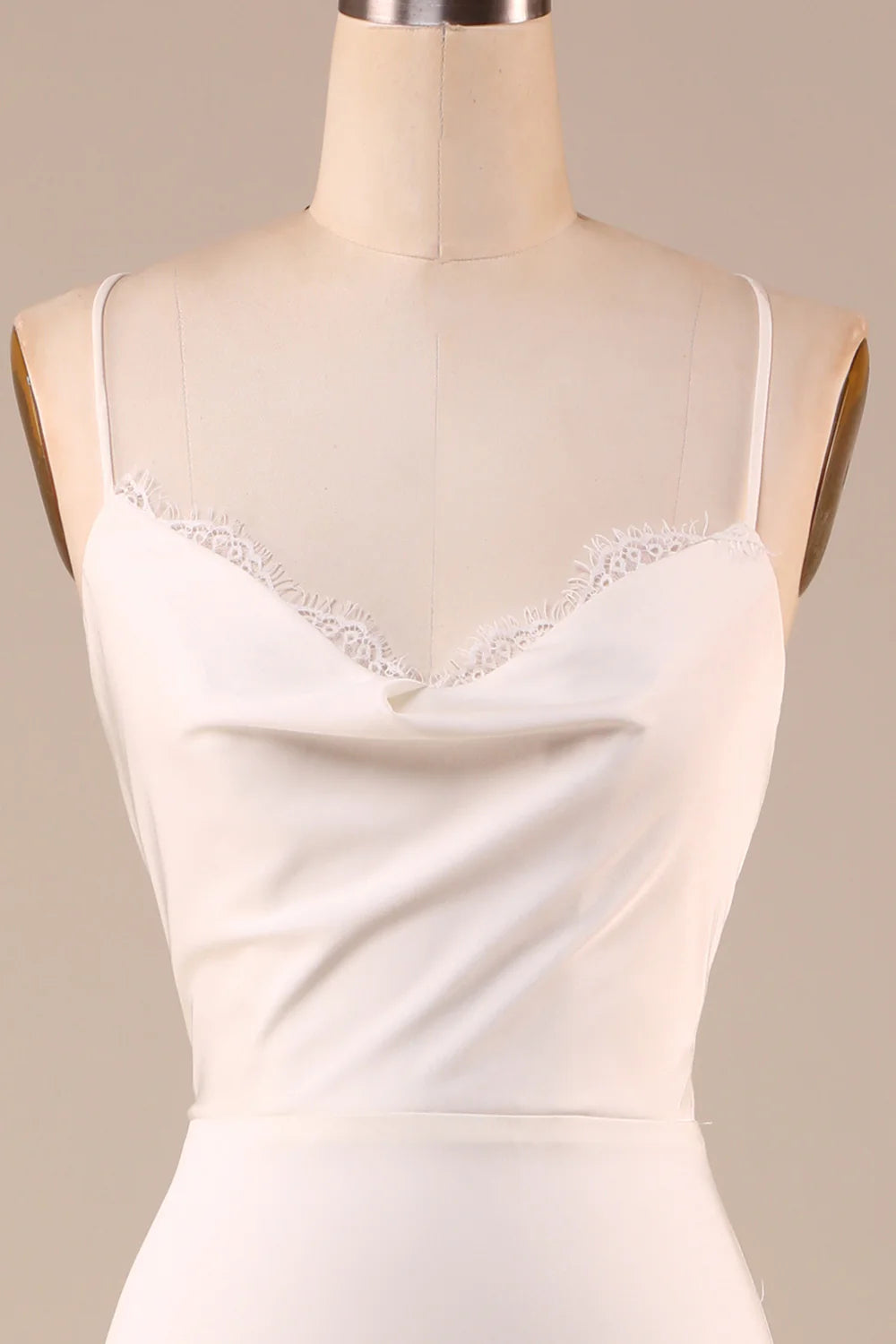 Side view of elegant ivory mermaid wedding gown.