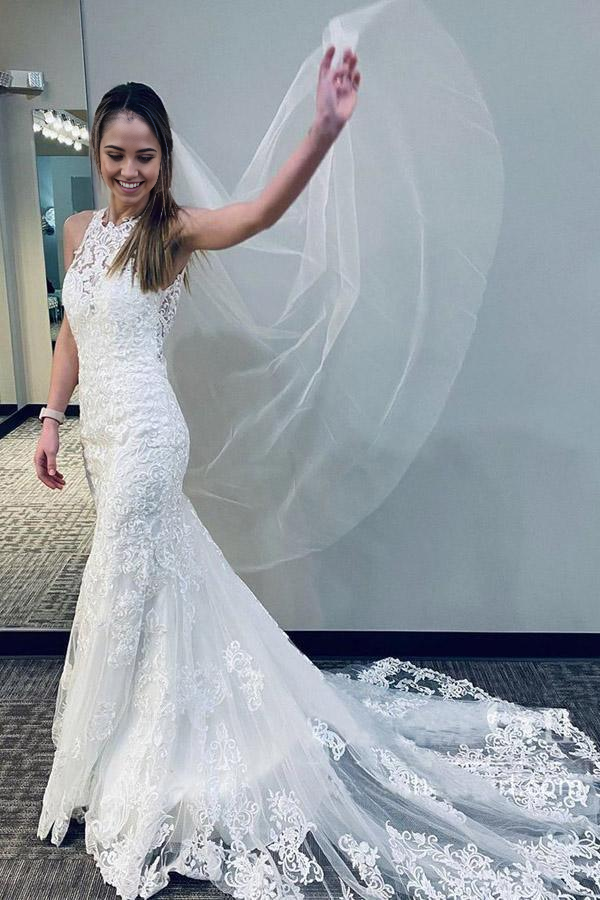 Elegant mermaid lace wedding gown with V-neck and racer back.