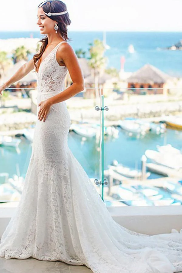 Close-up of the lace detail on a V-neck mermaid wedding dress.