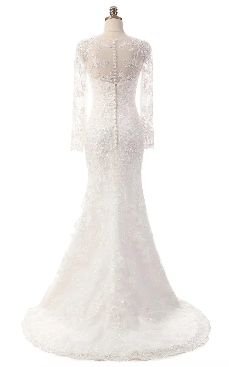 Back view of an ivory mermaid lace gown, showcasing intricate lace details and train.