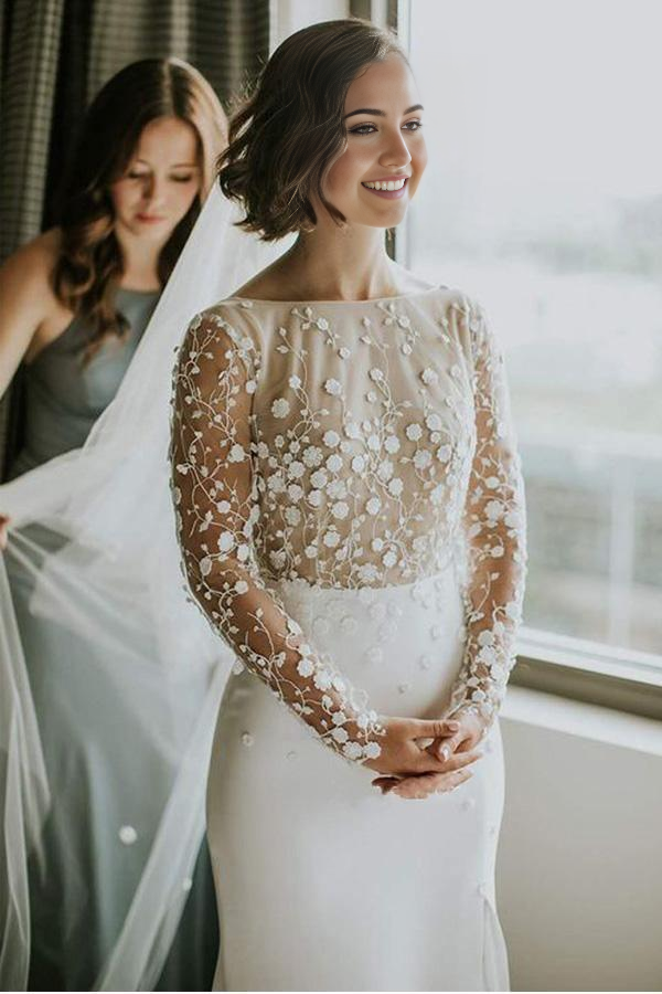 Close-up of lace detail and thigh-high split on a mermaid wedding gown.