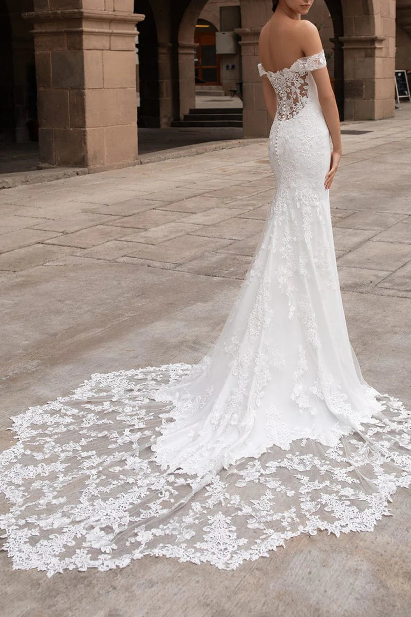 Close-up of the intricate lace details on the Mermaid Boho Off-Shoulder Wedding Gown.