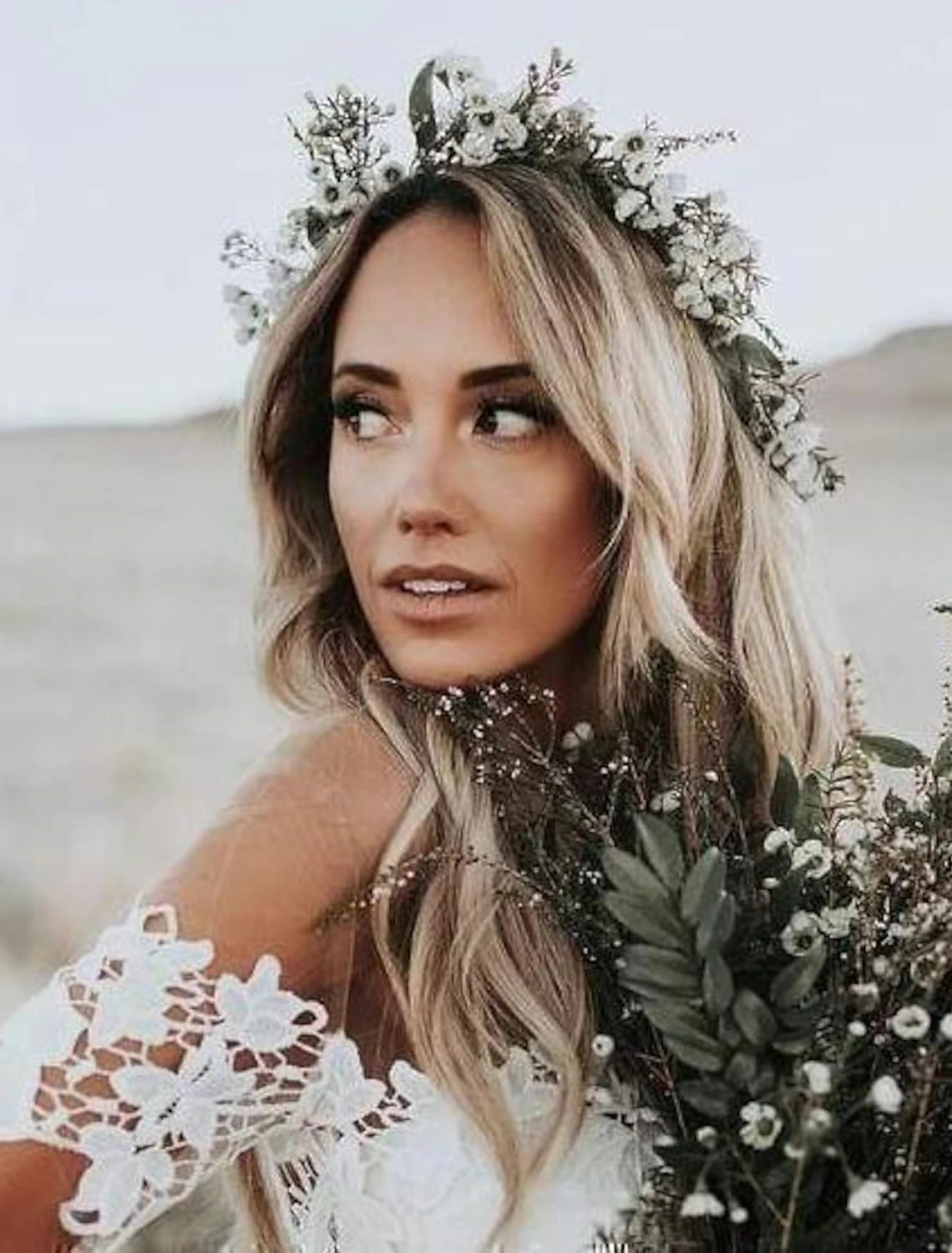Full length view of the romantic off-shoulder mermaid wedding dress.