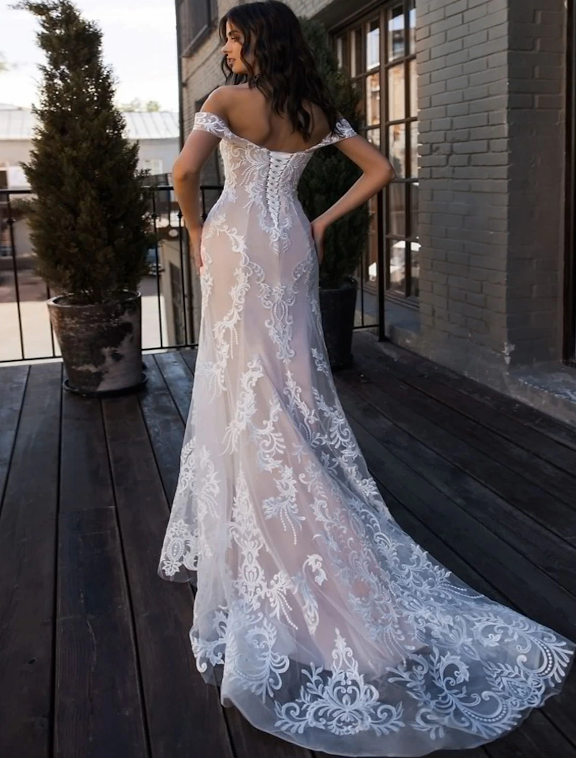 Close-up of the lace detail on an Off Shoulder Cap Sleeve Mermaid Wedding Dress.