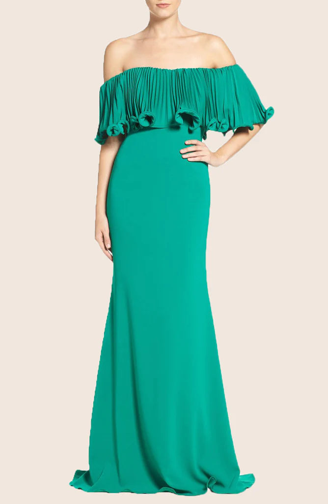 Model wearing an elegant mermaid off-shoulder formal gown.