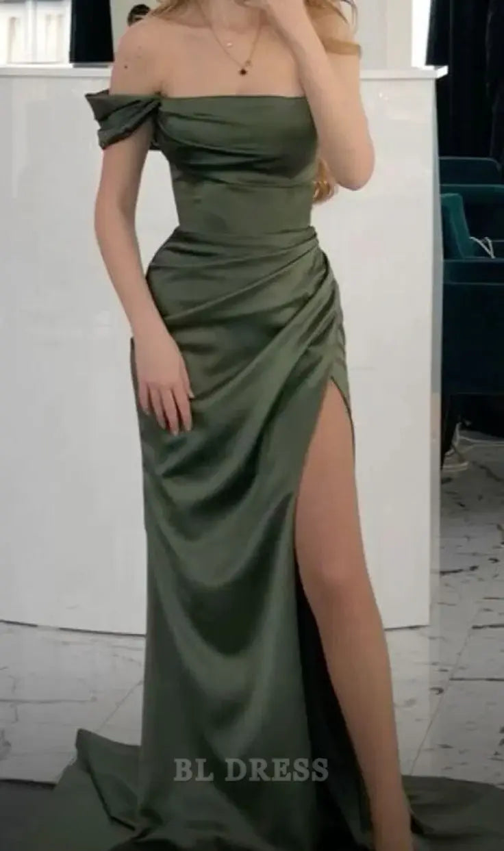 Woman wearing an elegant green mermaid off-shoulder long formal dress.
