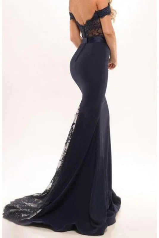 Back view of a woman wearing a mermaid off-shoulder lace prom dress.