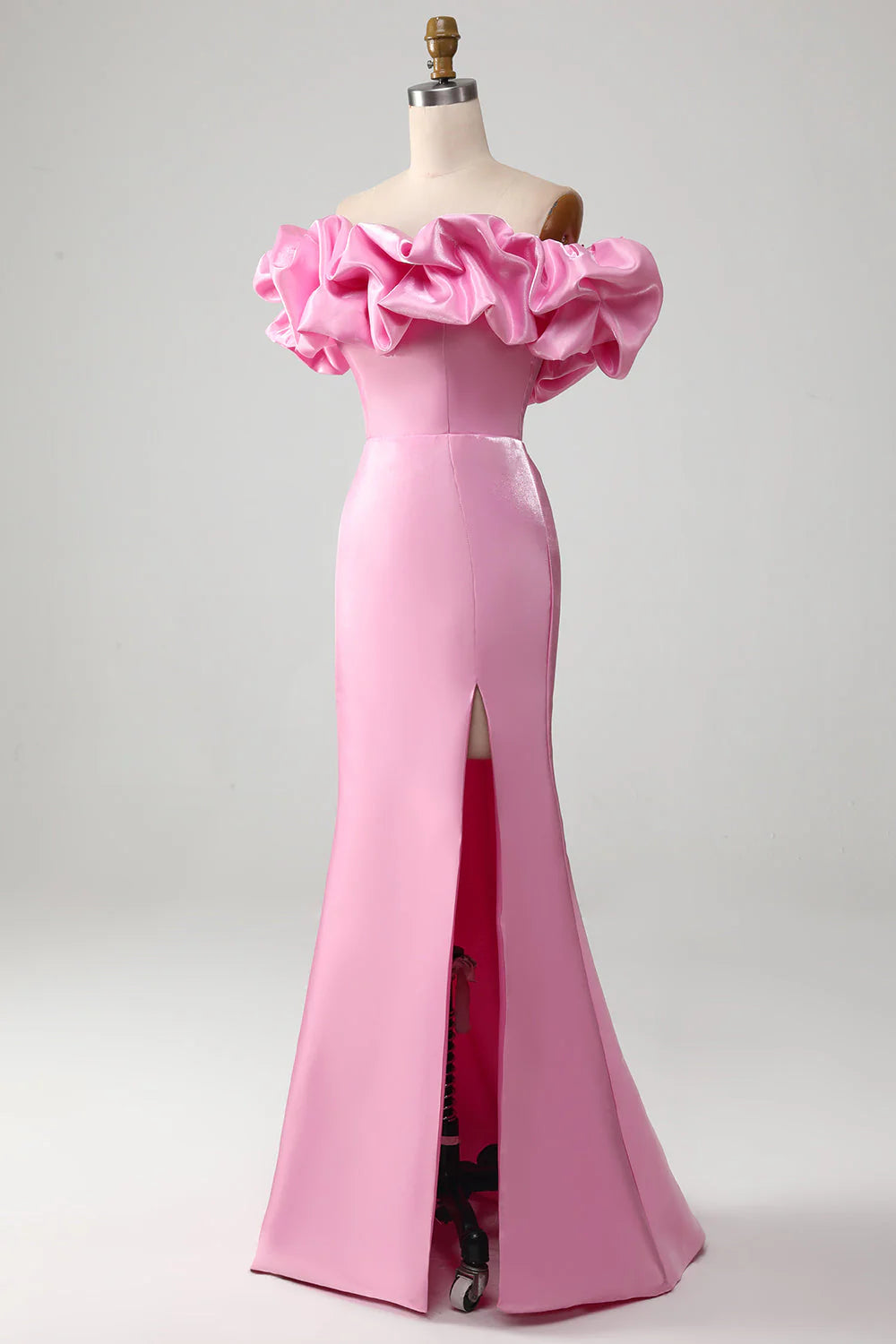 Pink mermaid off-shoulder prom dress, side view.