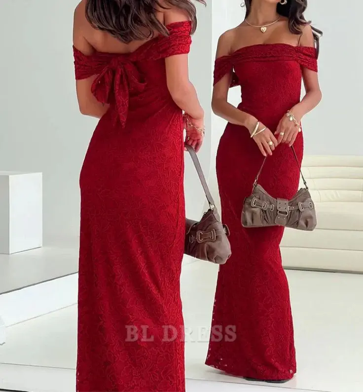 Woman wearing a red lace mermaid off-shoulder formal dress.