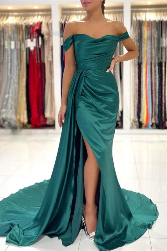 Elegant dark green mermaid prom dress with off-shoulder ruffles and a split skirt.