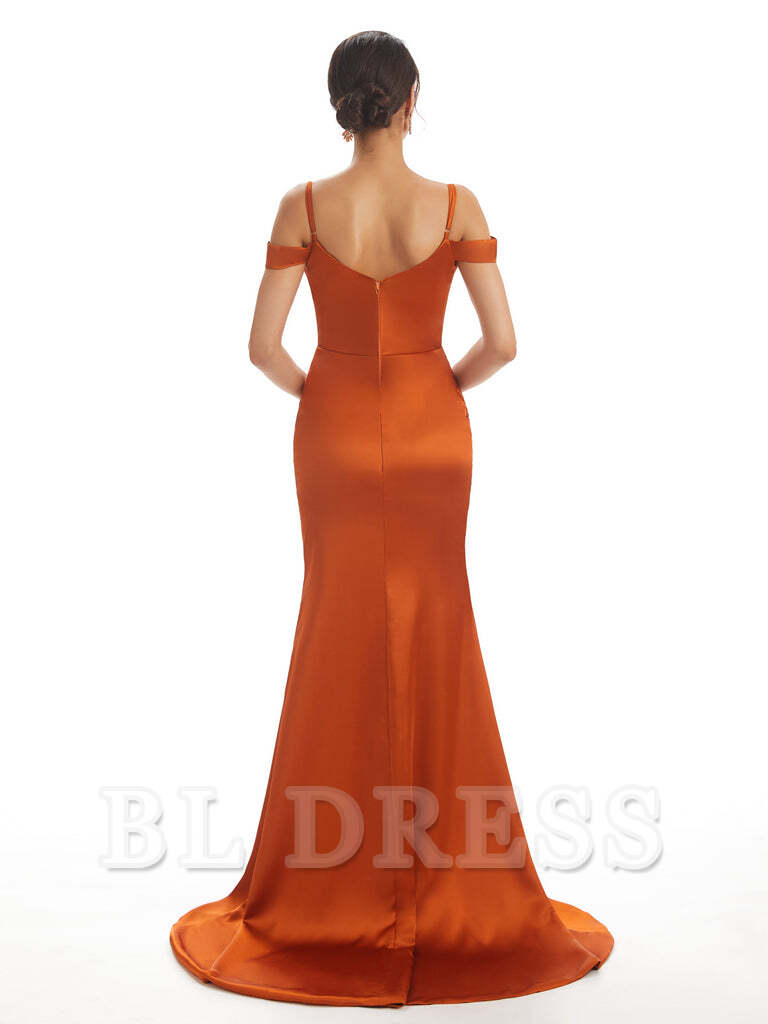 Side view of a woman in a mermaid off-shoulder satin dress, highlighting the side slit.