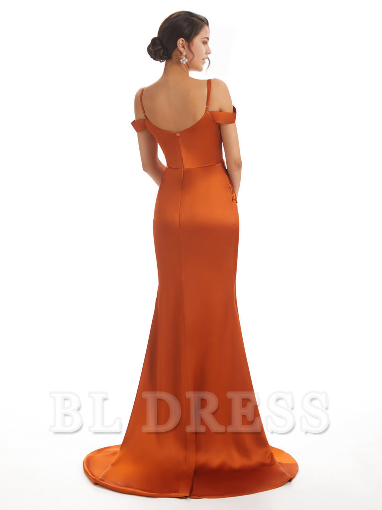 Close-up of the off-shoulder neckline and luxurious satin fabric of the formal dress.