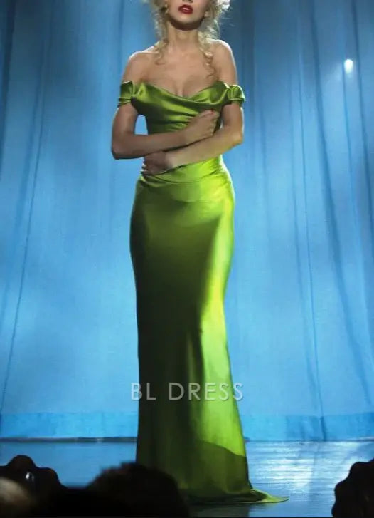Full-length view of a green off-shoulder satin mermaid dress.
