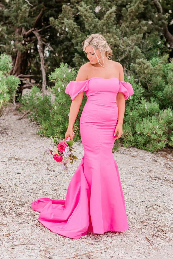 Hot pink mermaid prom dress with off-shoulder strapless design.