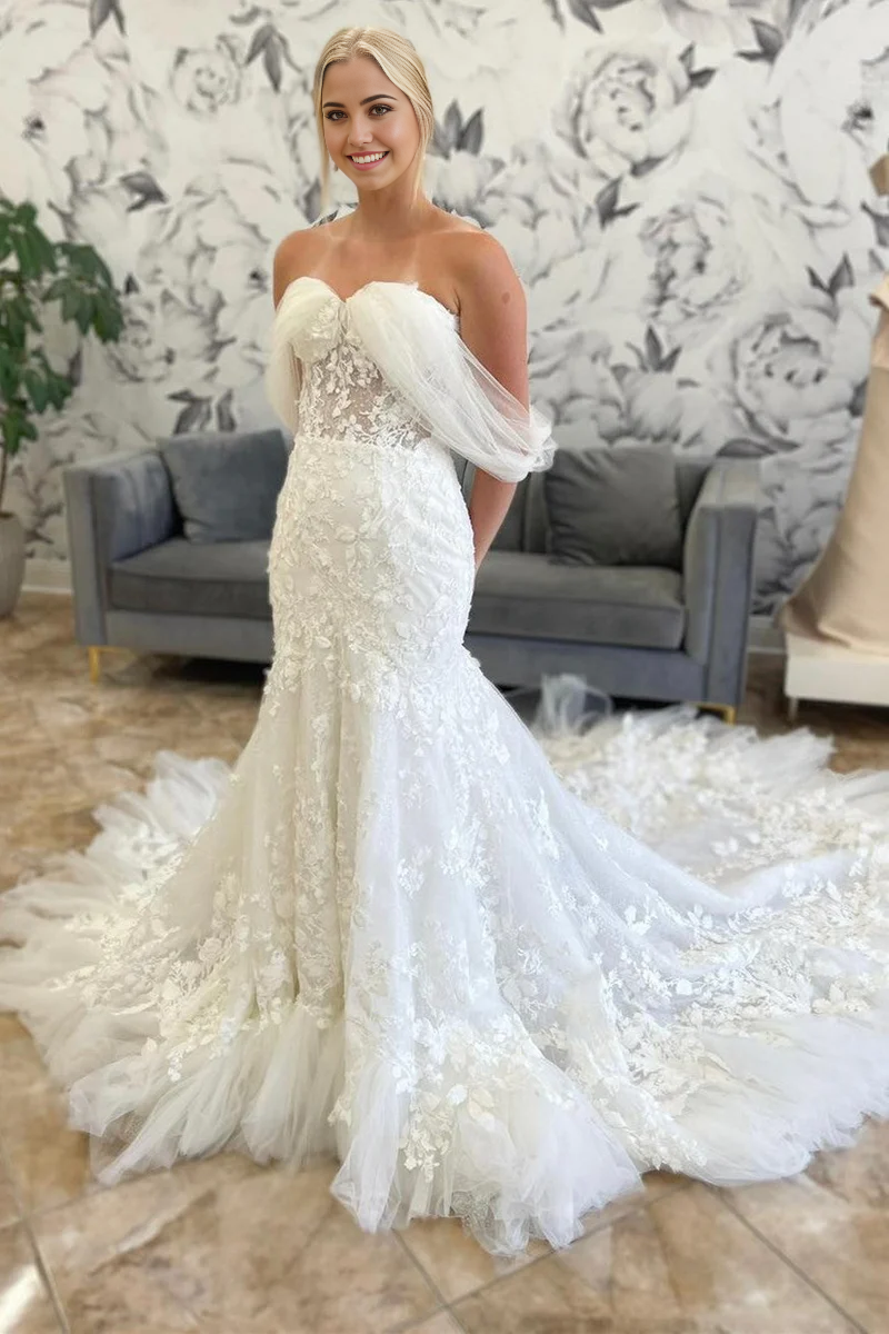 Full-length view of the mermaid off-shoulder wedding dress with tulle appliques.