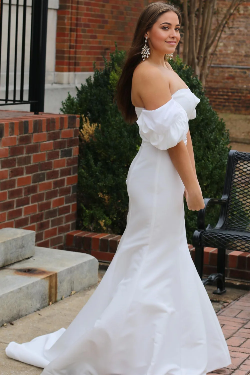 Back view of a long mermaid wedding gown.