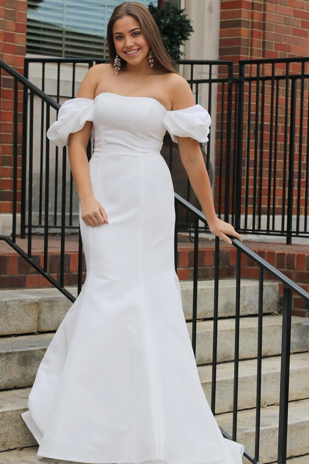 Close-up of the off-the-shoulder puff sleeve on a wedding dress.