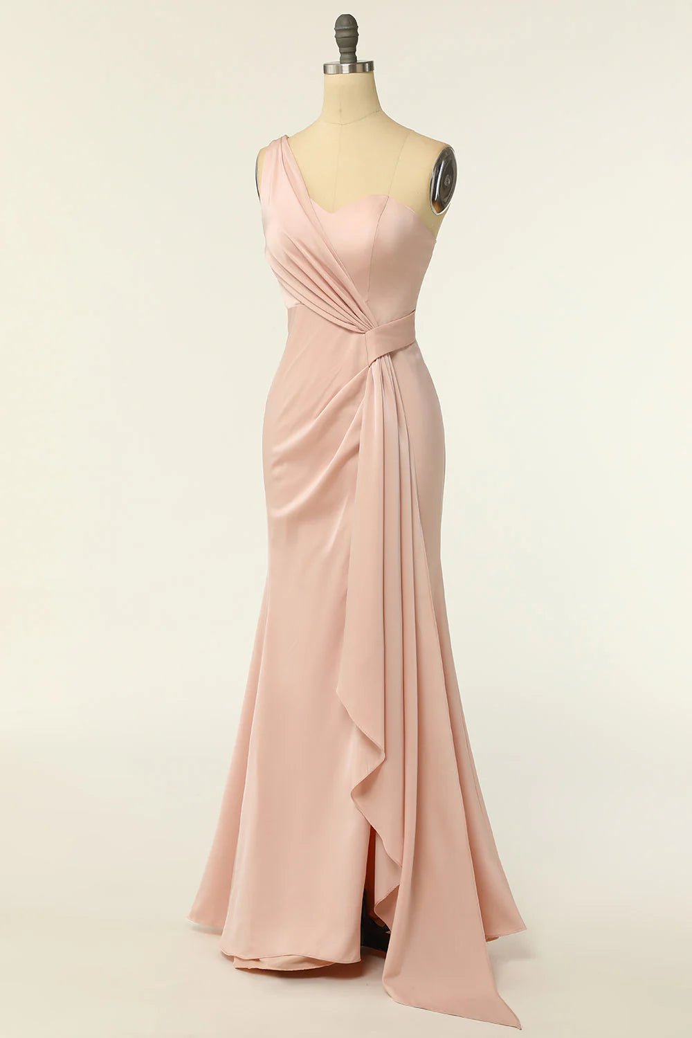 Back view of a woman in a long mermaid one-shoulder dress, showcasing the silhouette.