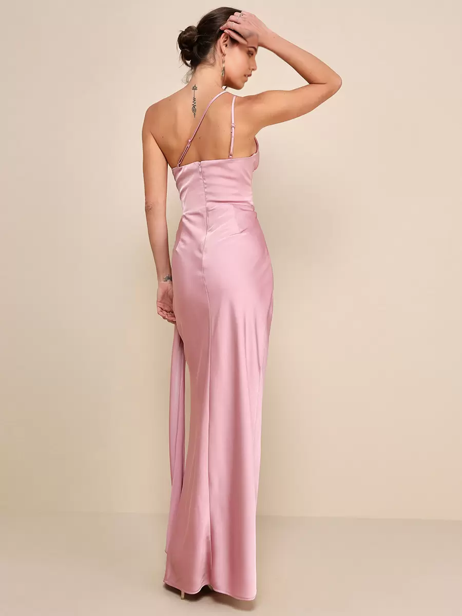 Back view of woman in one-shoulder mermaid gown with ruched details.
