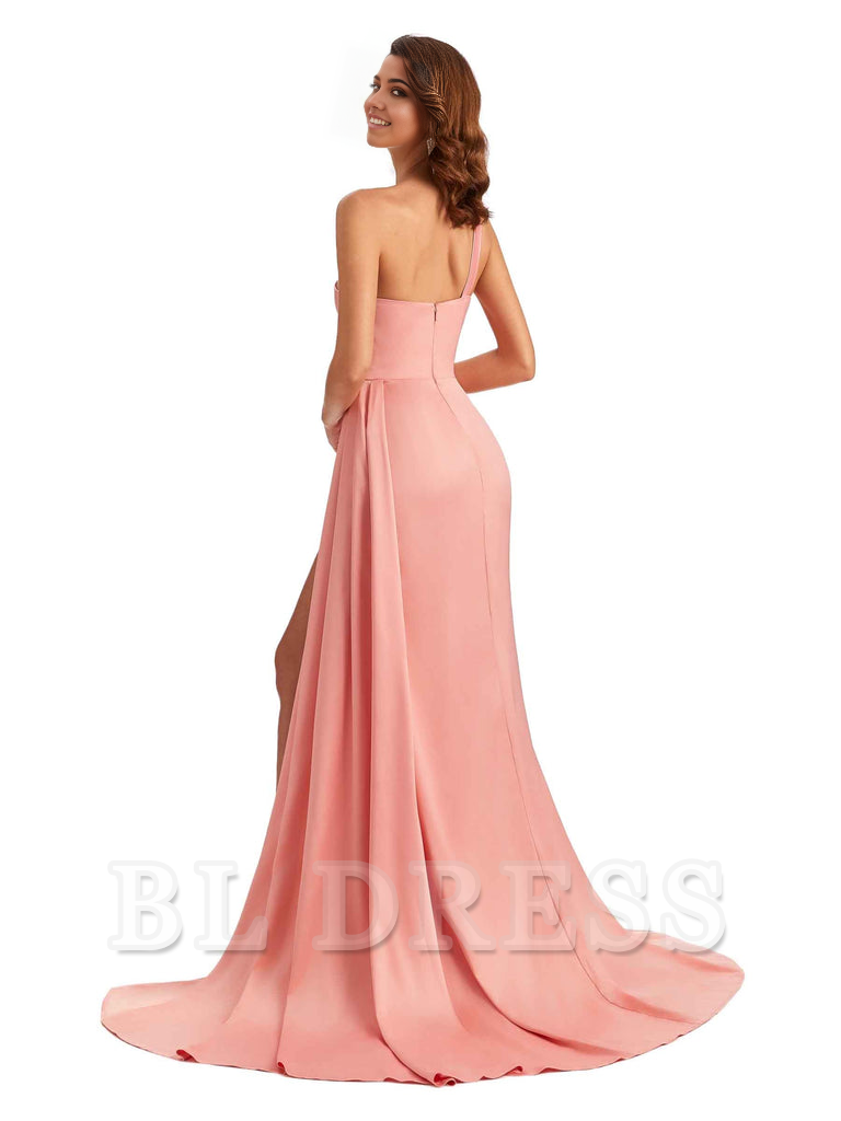 Full length view of a woman in a mermaid satin evening gown.