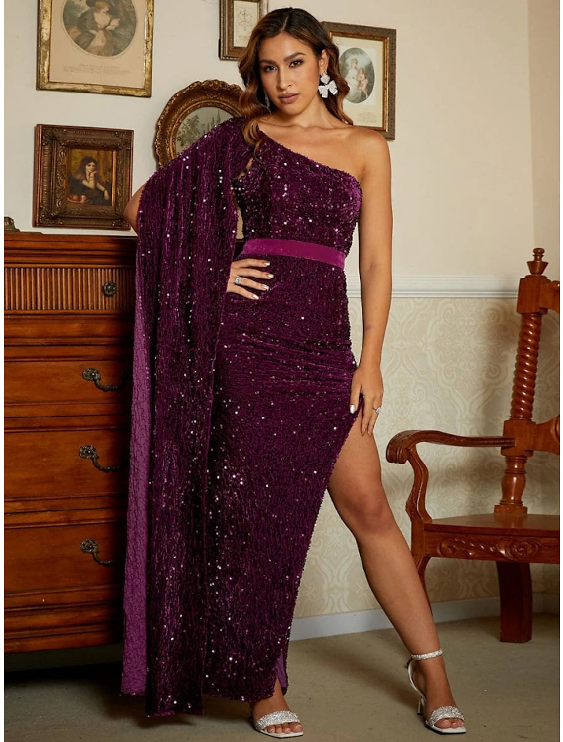 Back view of the black one-shoulder sequined evening dress.