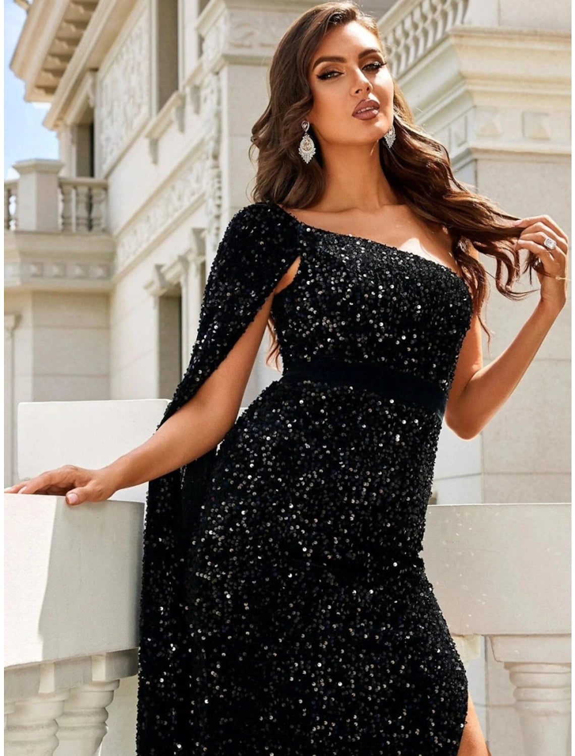 Full length view of the black mermaid formal dress.