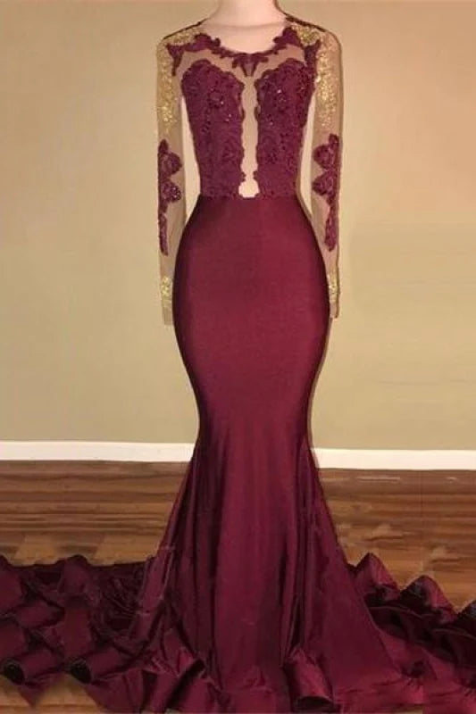 Woman wearing an elegant mermaid prom dress with an open back.